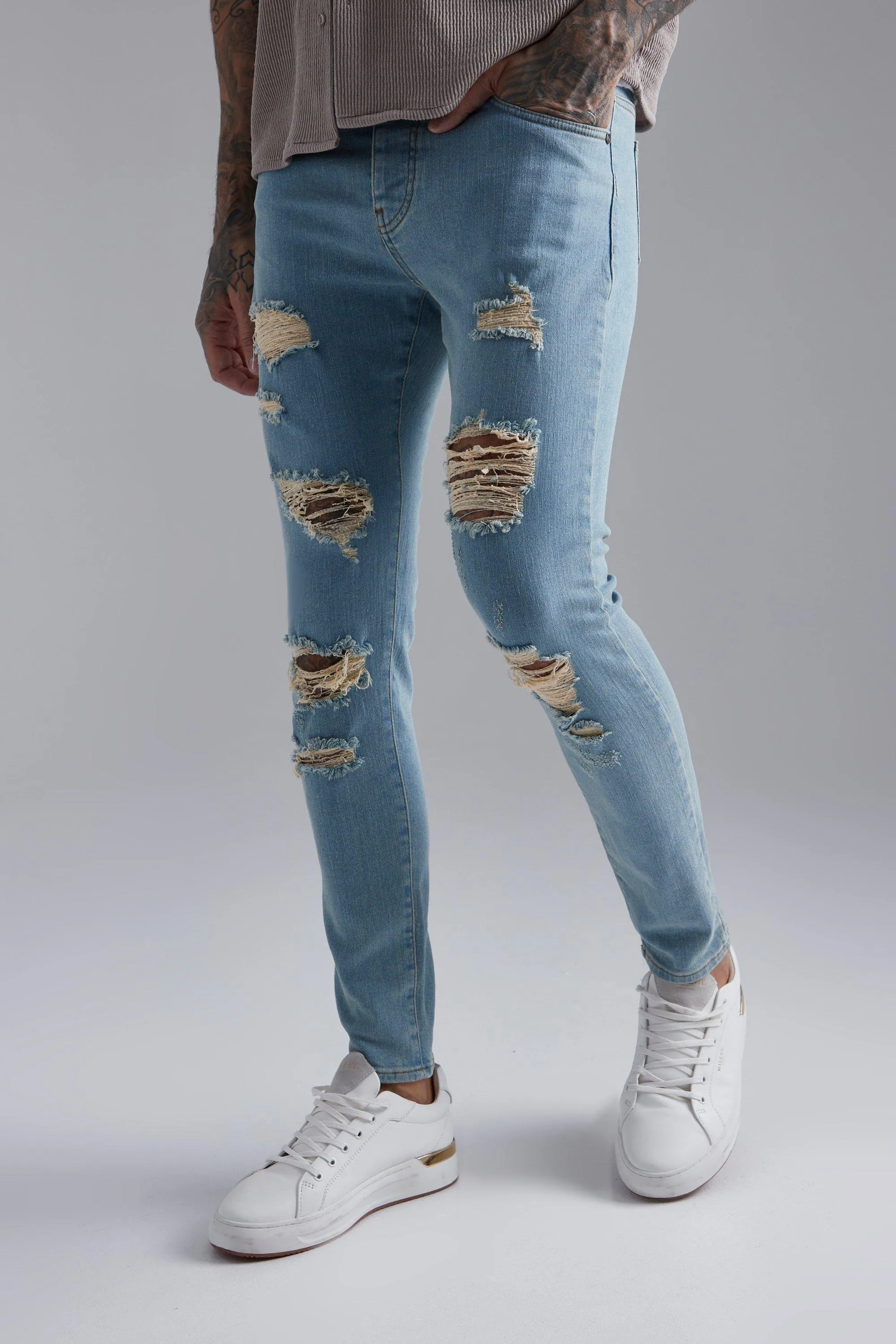 Skinny Stretch All Over Rip Jeans | boohooMAN UK